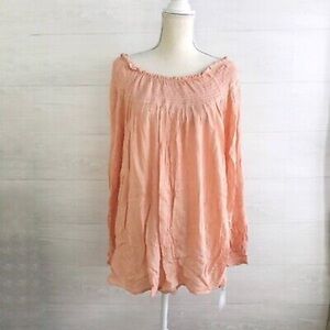 A-Glow peachy colored maternity top